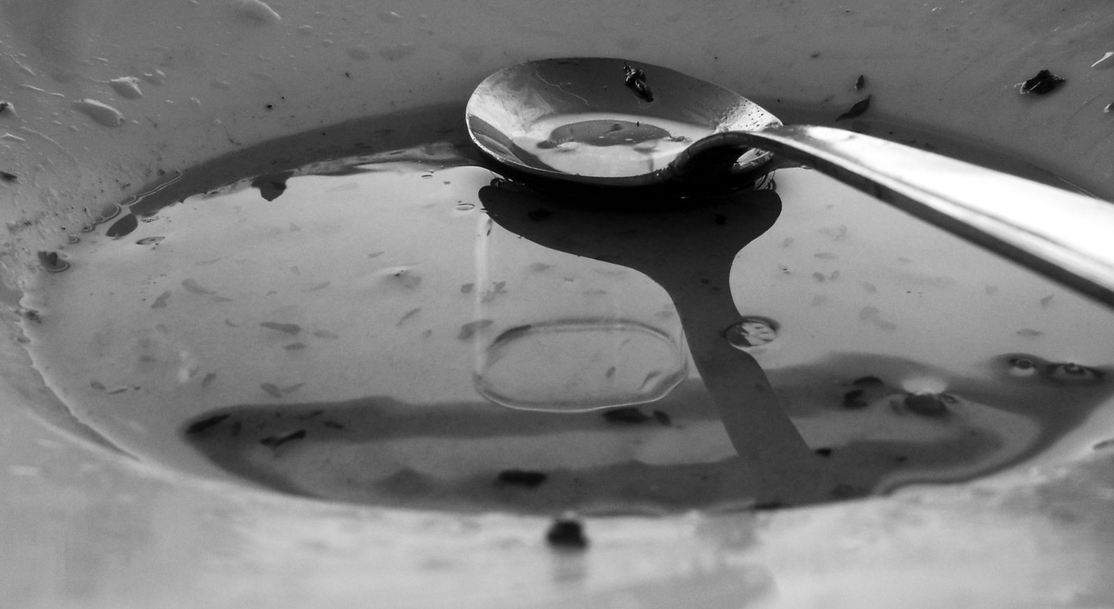 a spoon is sitting in some water