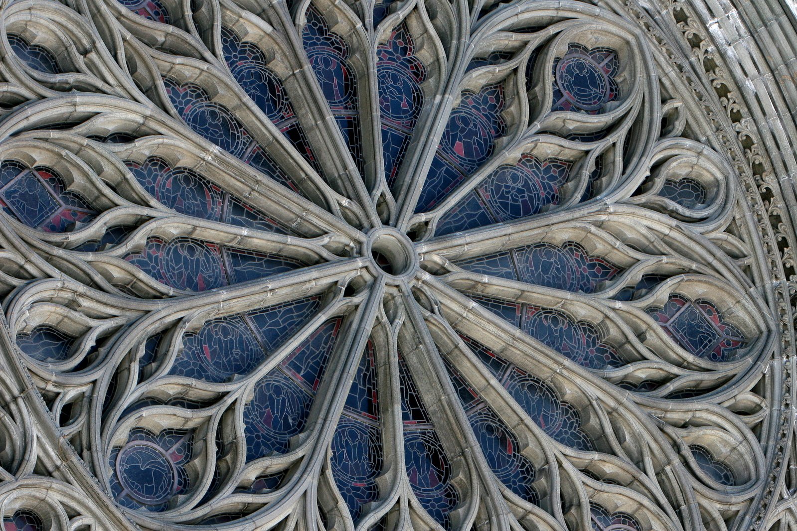 a intricate design is seen in a stained glass window