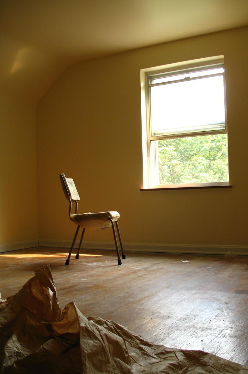 the room is empty and there is a skylight in it