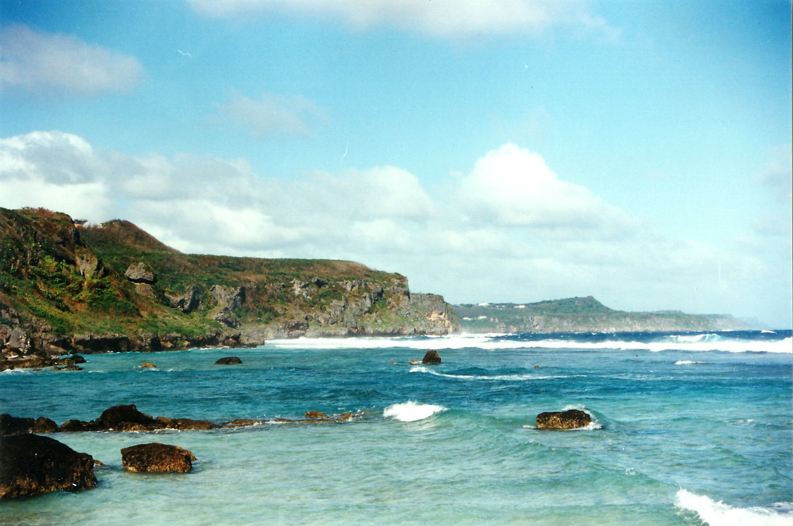 rocks near the shoreline of a secluded cove