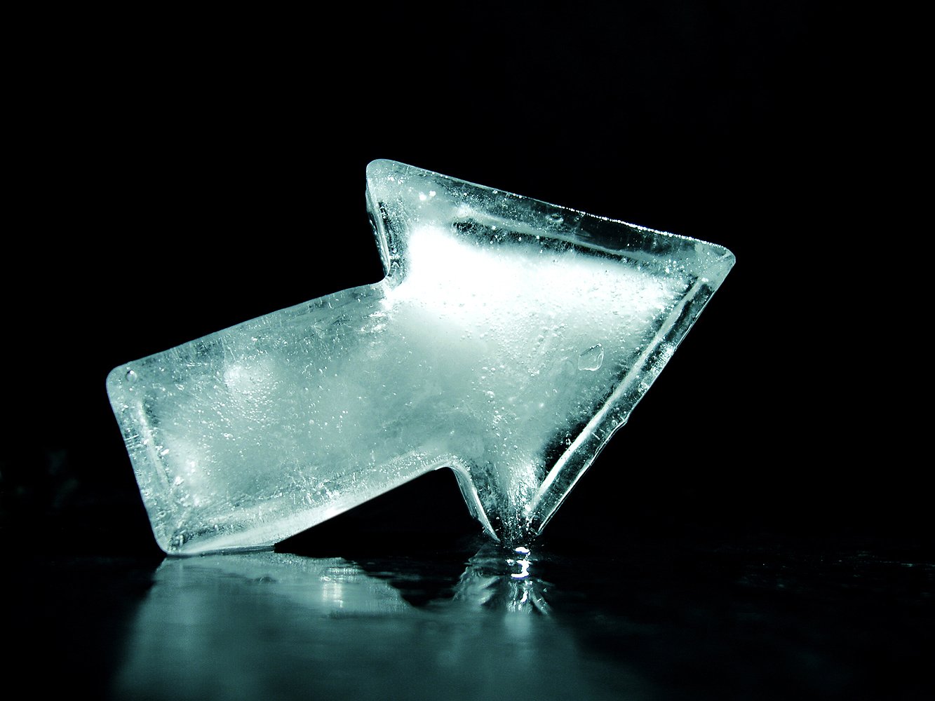 an ice like object is shining in the dark