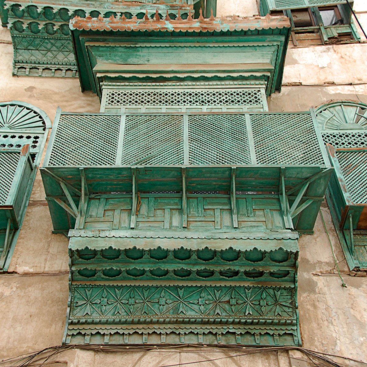 an artistically ornate architectural design against an old building