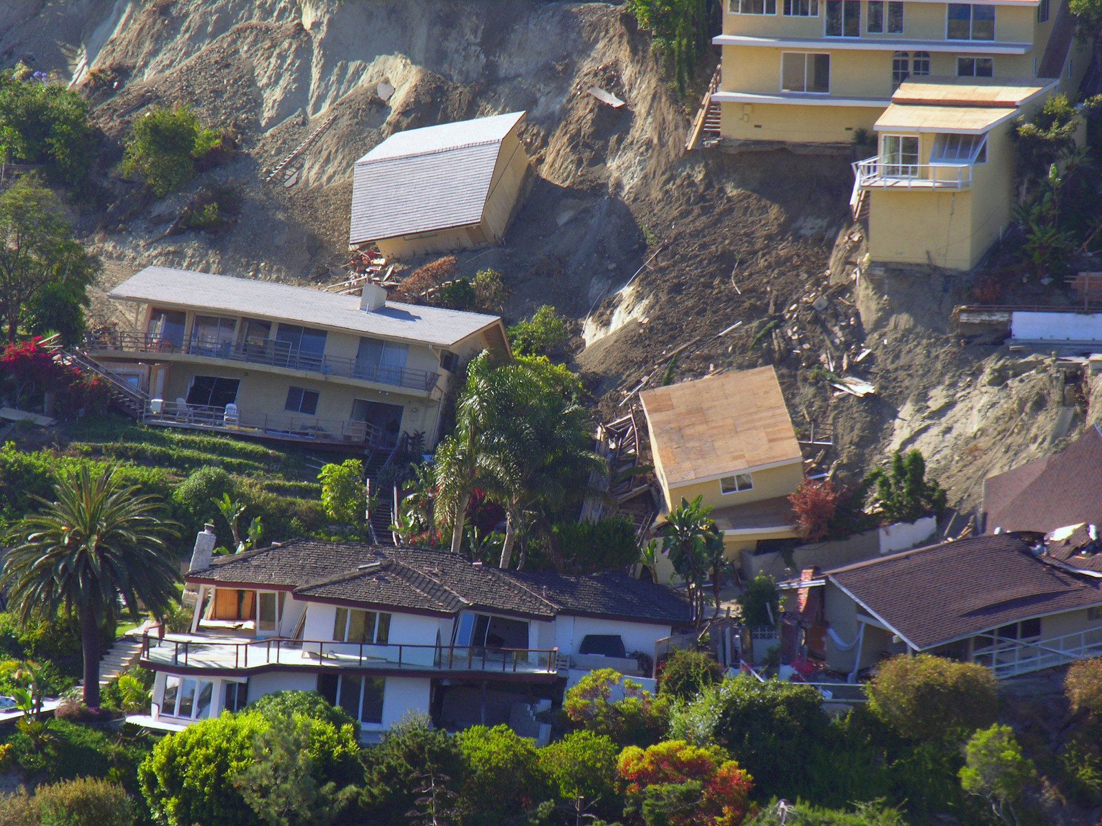 the view of homes that is surrounded by cliffs