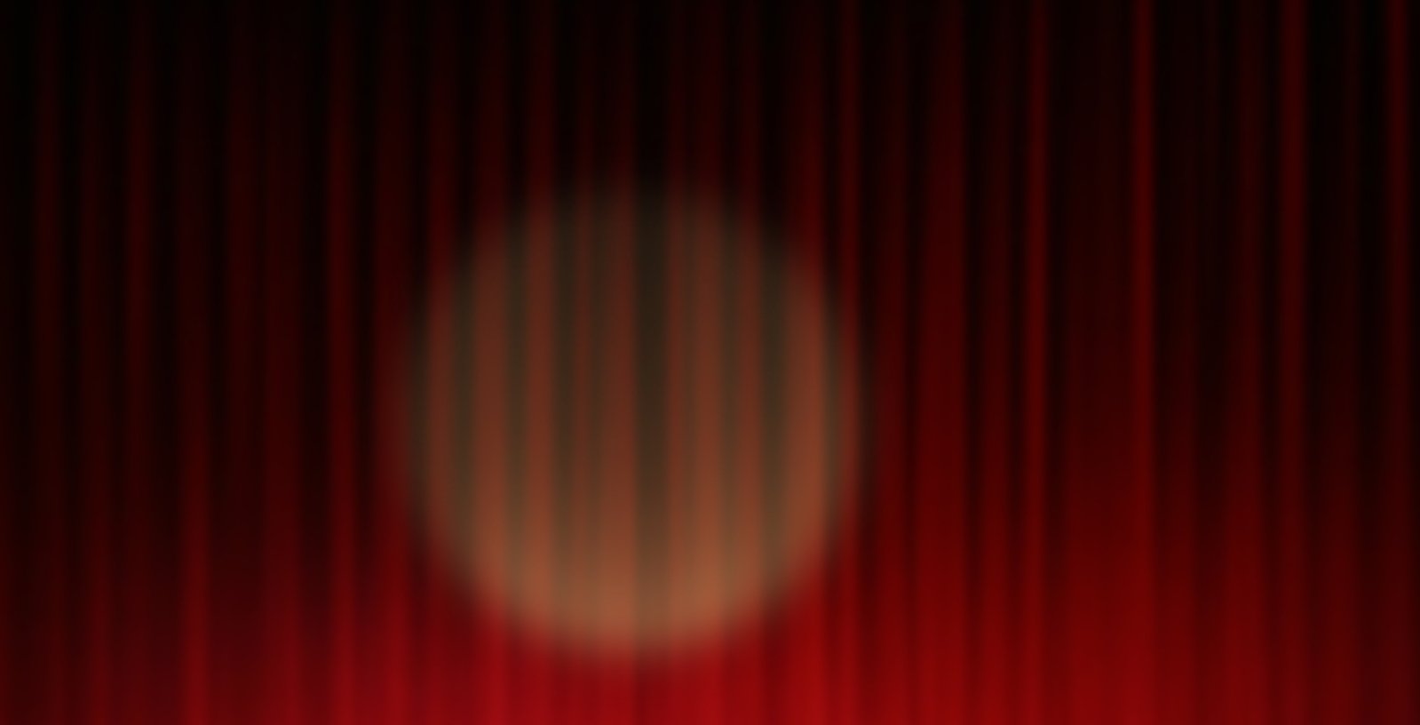 an abstract background of red and black curtains