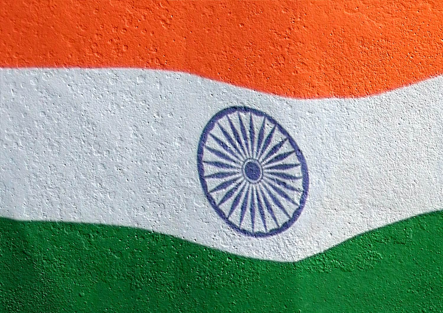 the flag of india painted on the side of a building