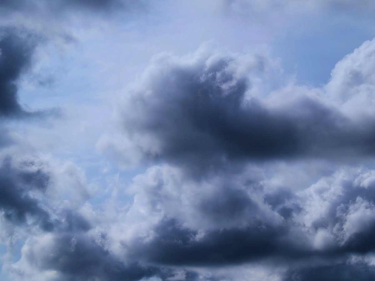 a group of gray clouds in the sky