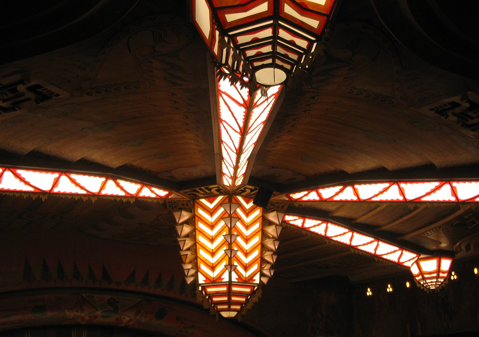 a very large roof structure with a light at the top