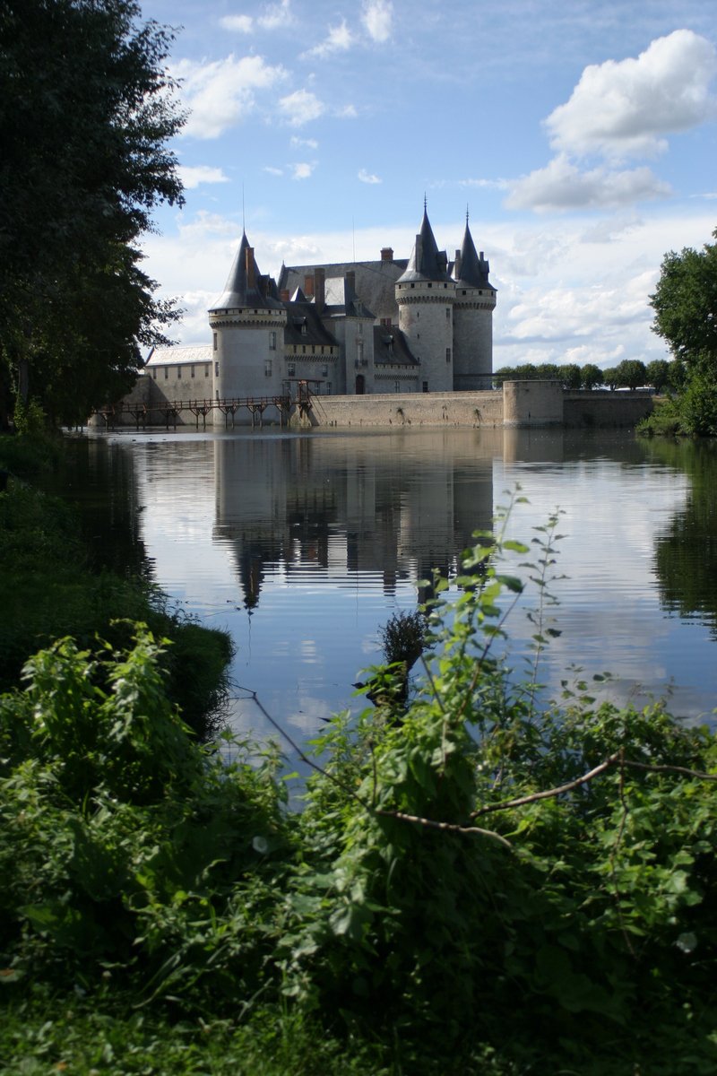 a castle that is next to a body of water