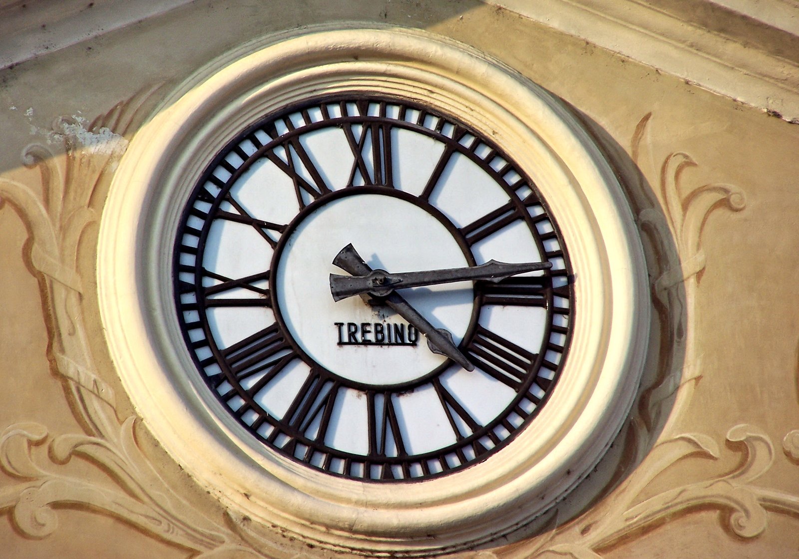 a large clock face sits on a building