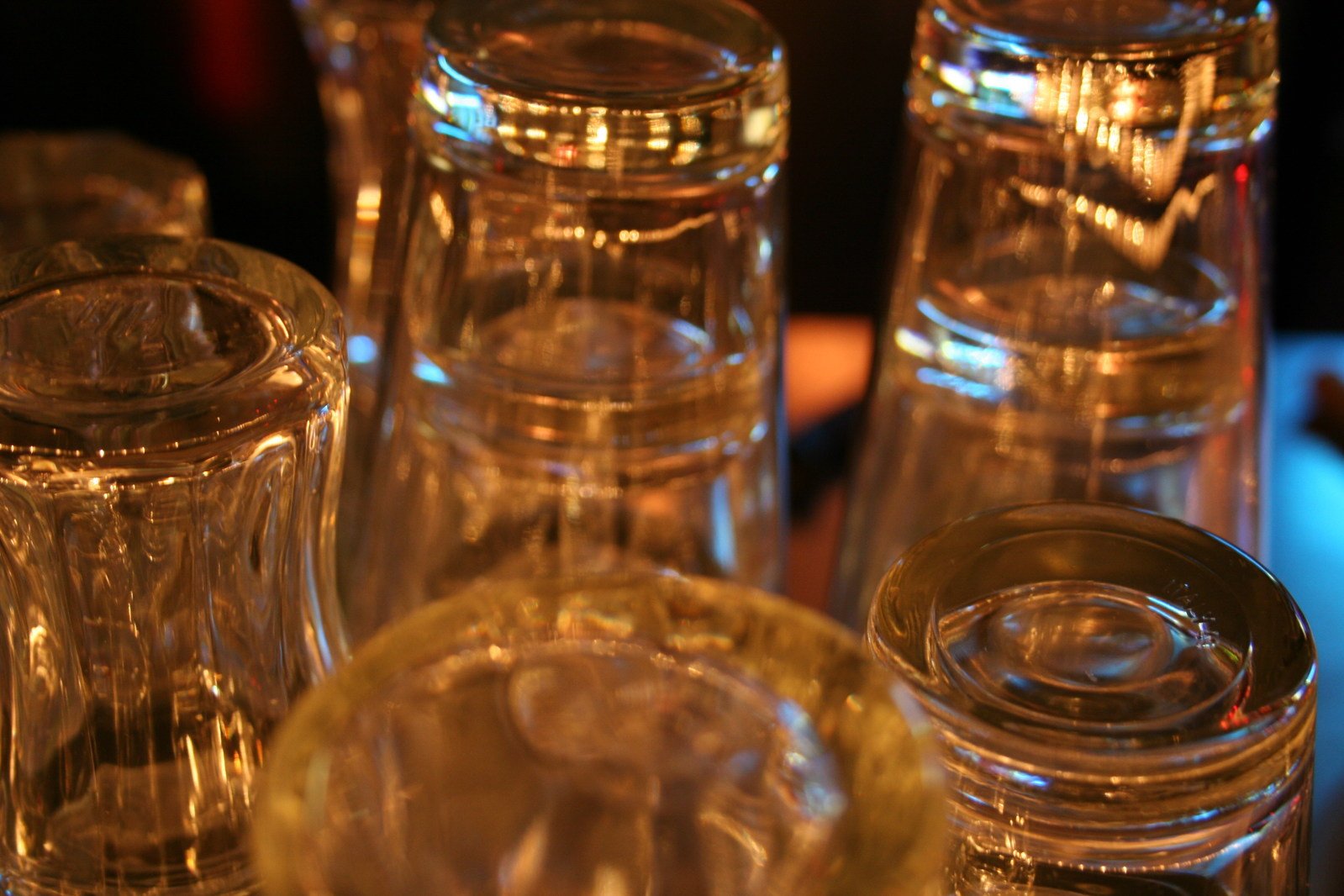 a close - up of clear glass jars of varying sizes