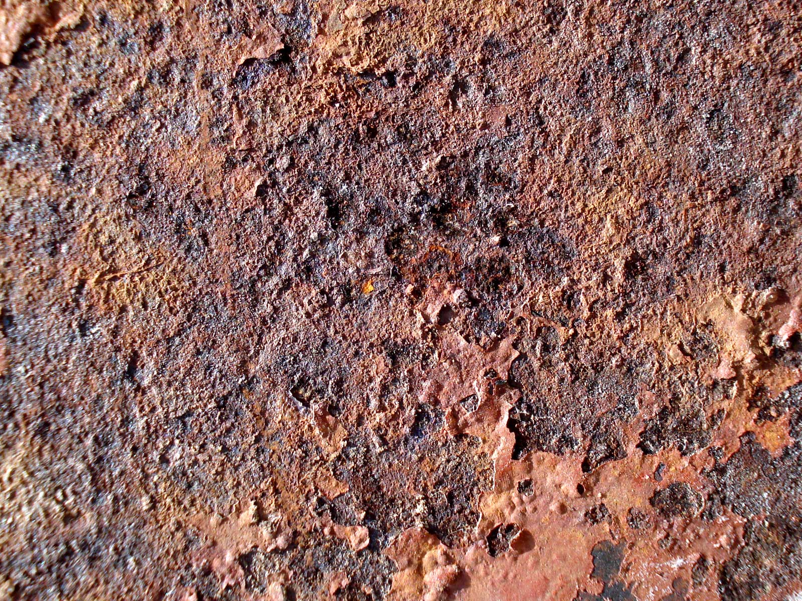 a brown and red background of many different colors