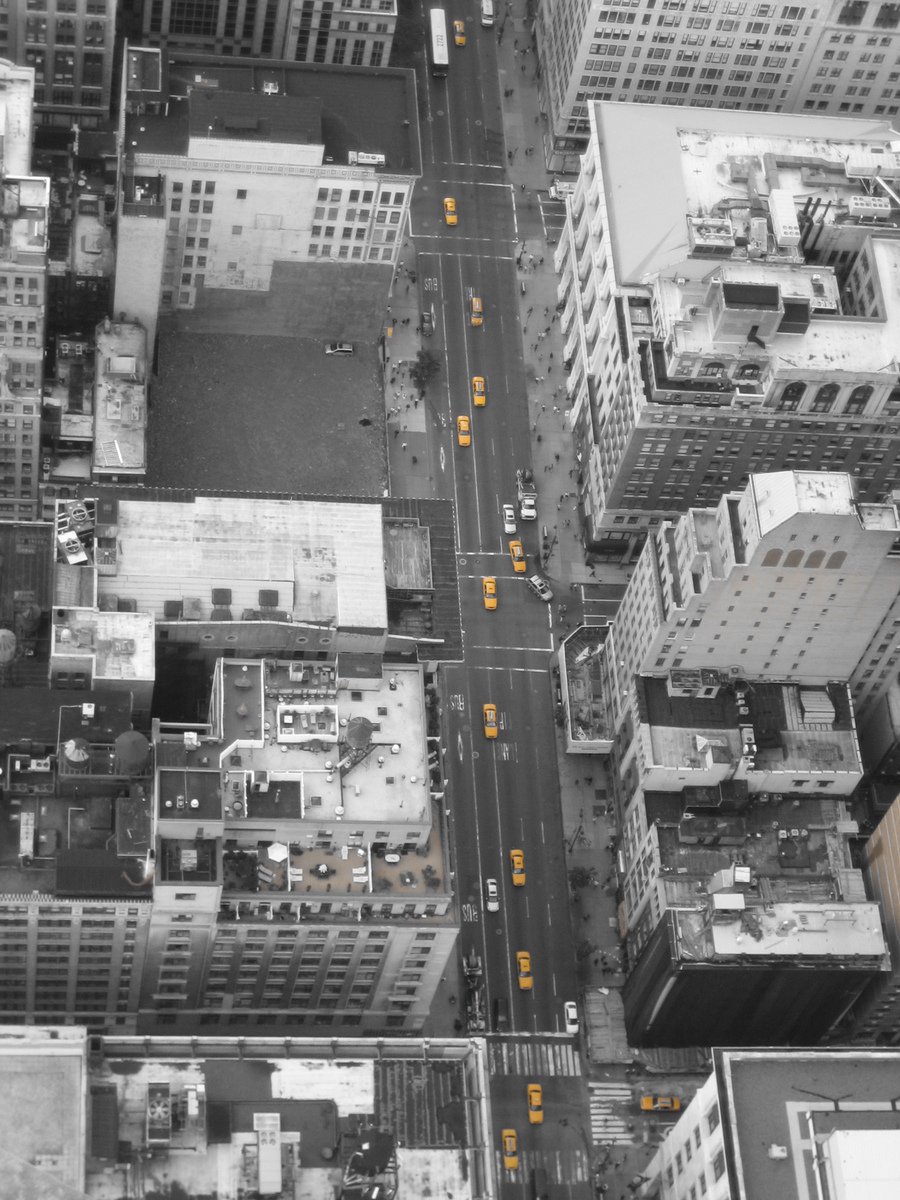 an aerial view of a street intersection and skyscrs