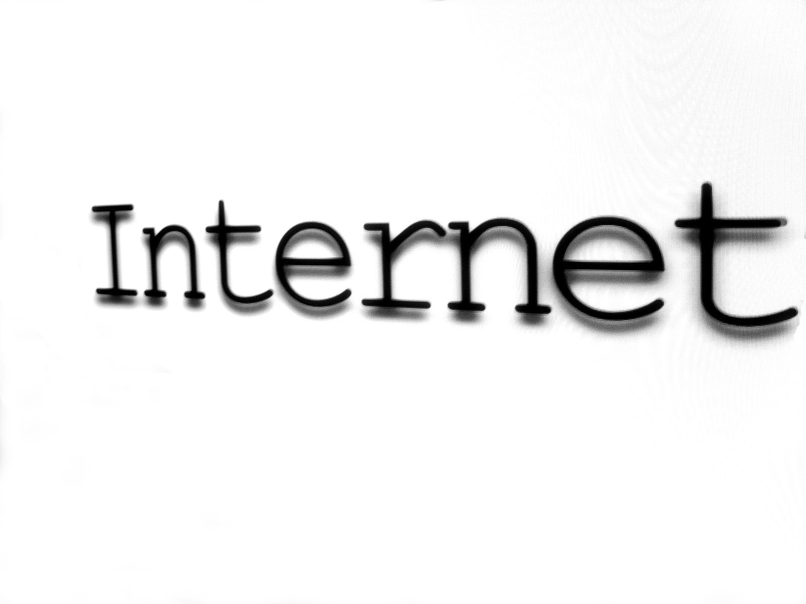 the word internet written on a white background