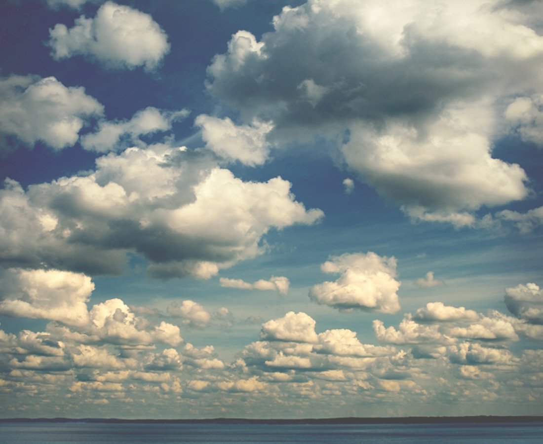 a view of the sky with clouds in it