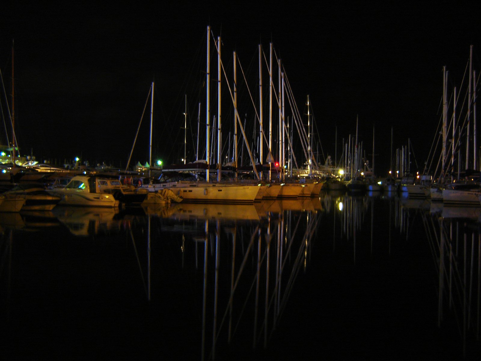 a harbor with some boats sitting parked in it