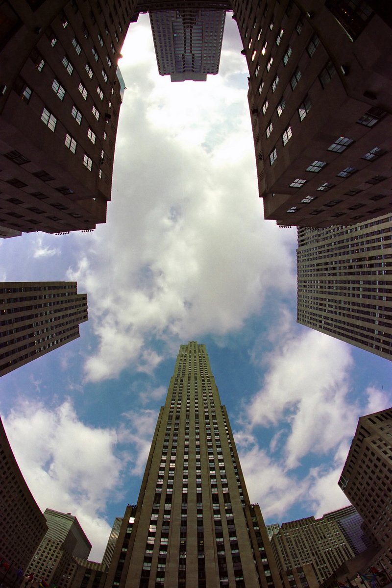 the sky is partly over a high rise building