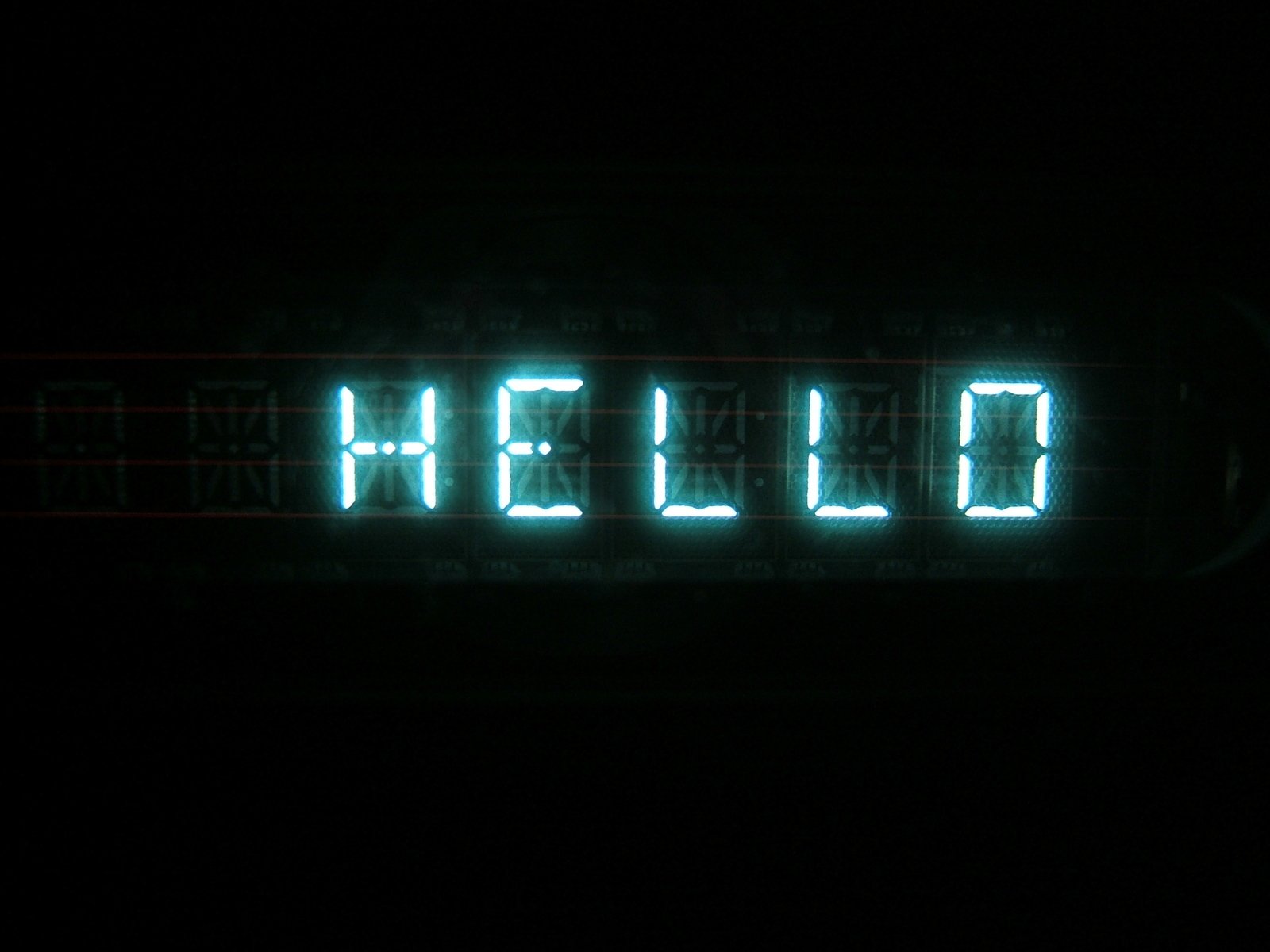 there is a time displayed on a clock that says hello