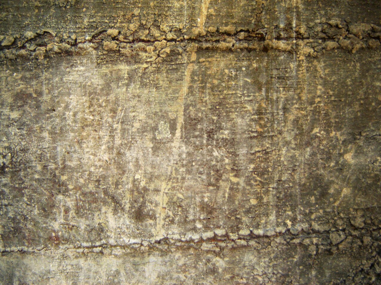 old dirty grey wall with s in it