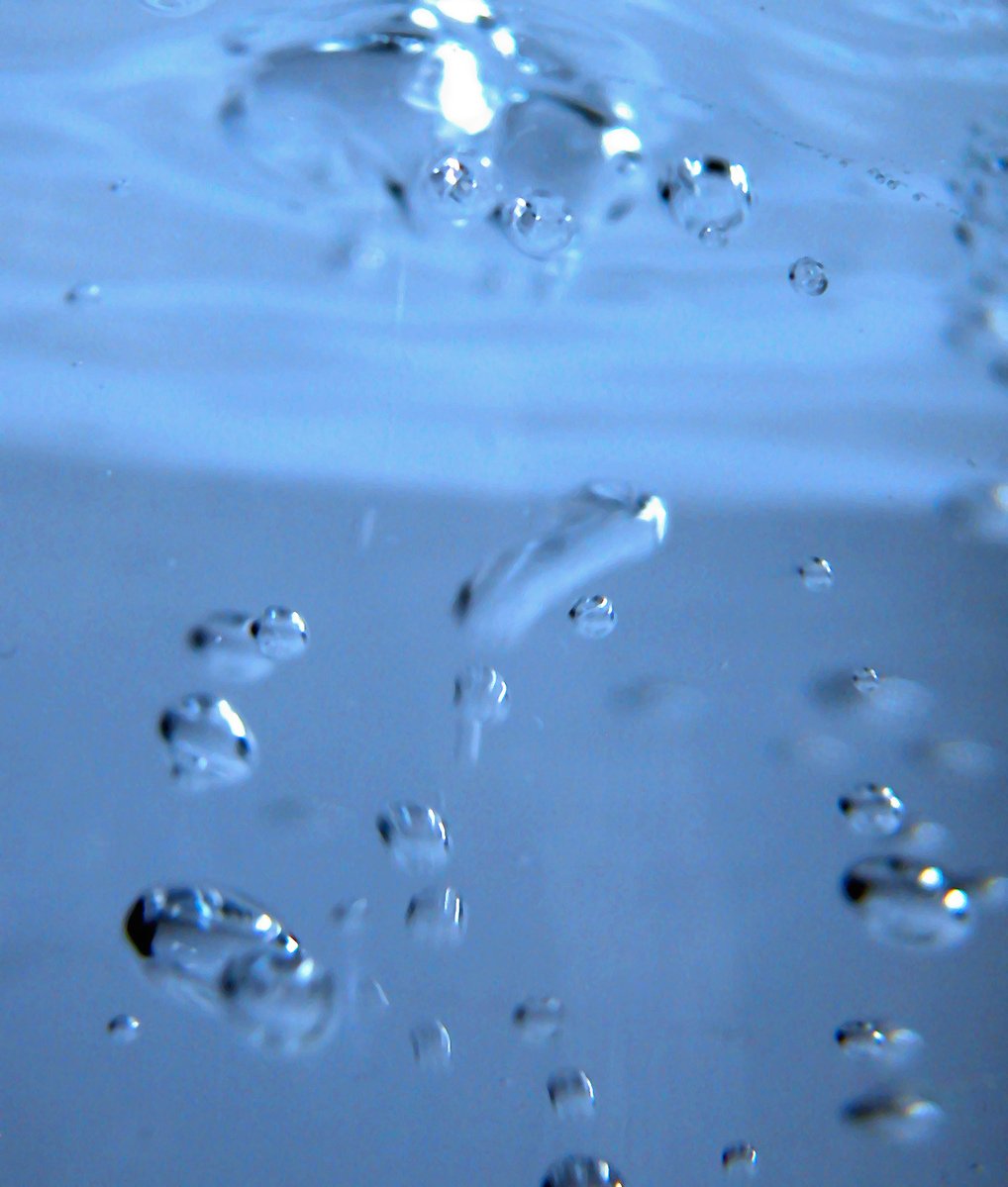 water bubbles floating in a blue tone po