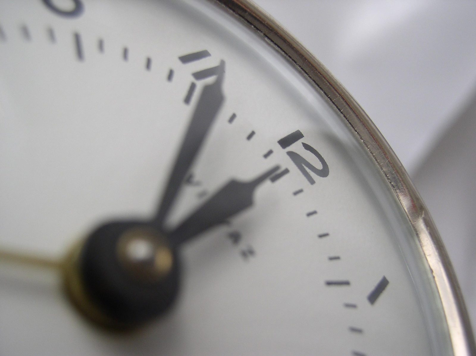 close up po of a clock face with numerals