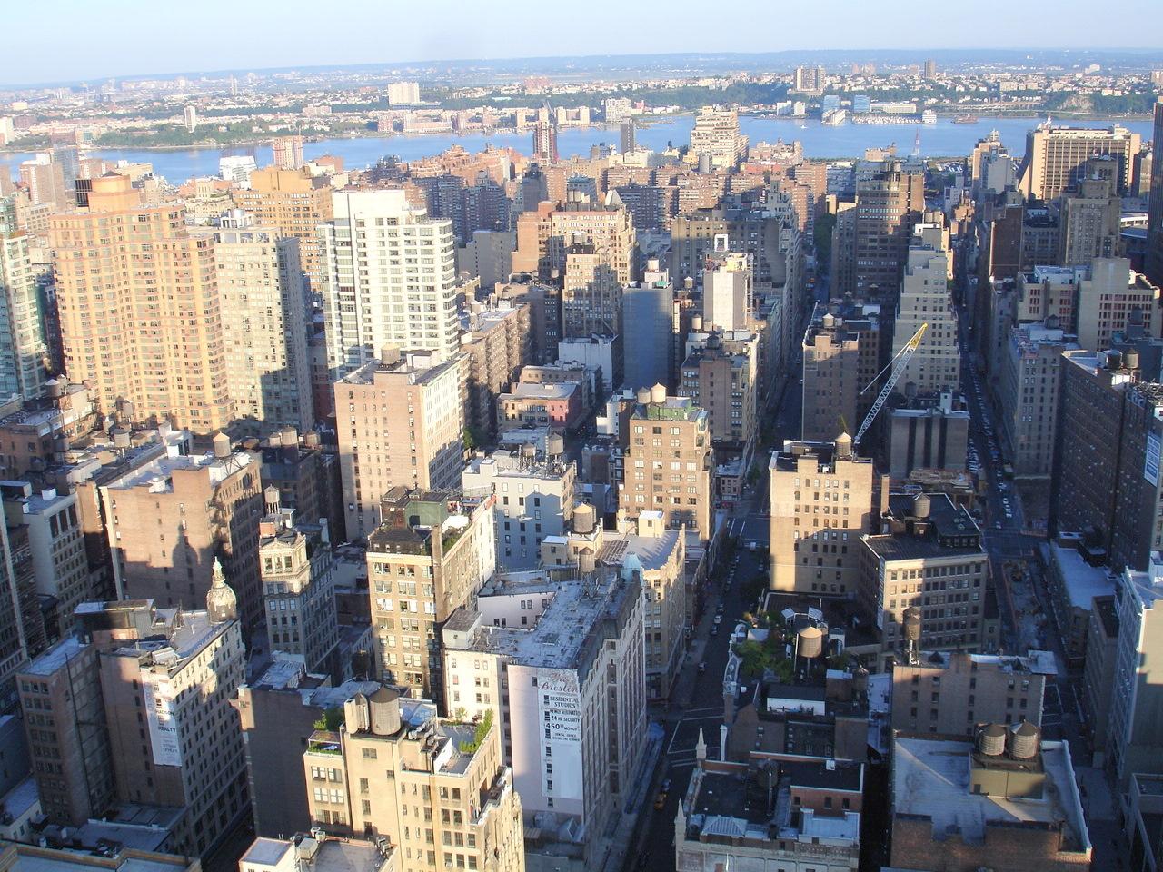 a view of the city from the top of a tower