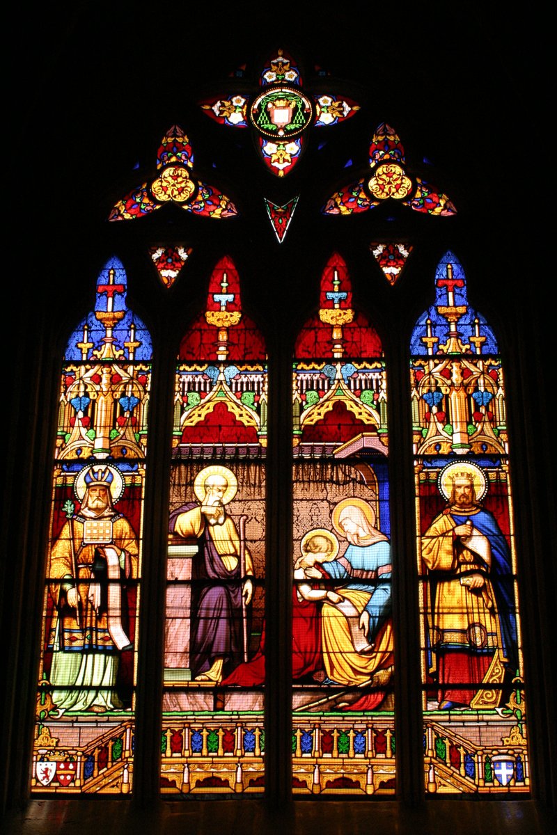 stained glass window showing the birth of jesus