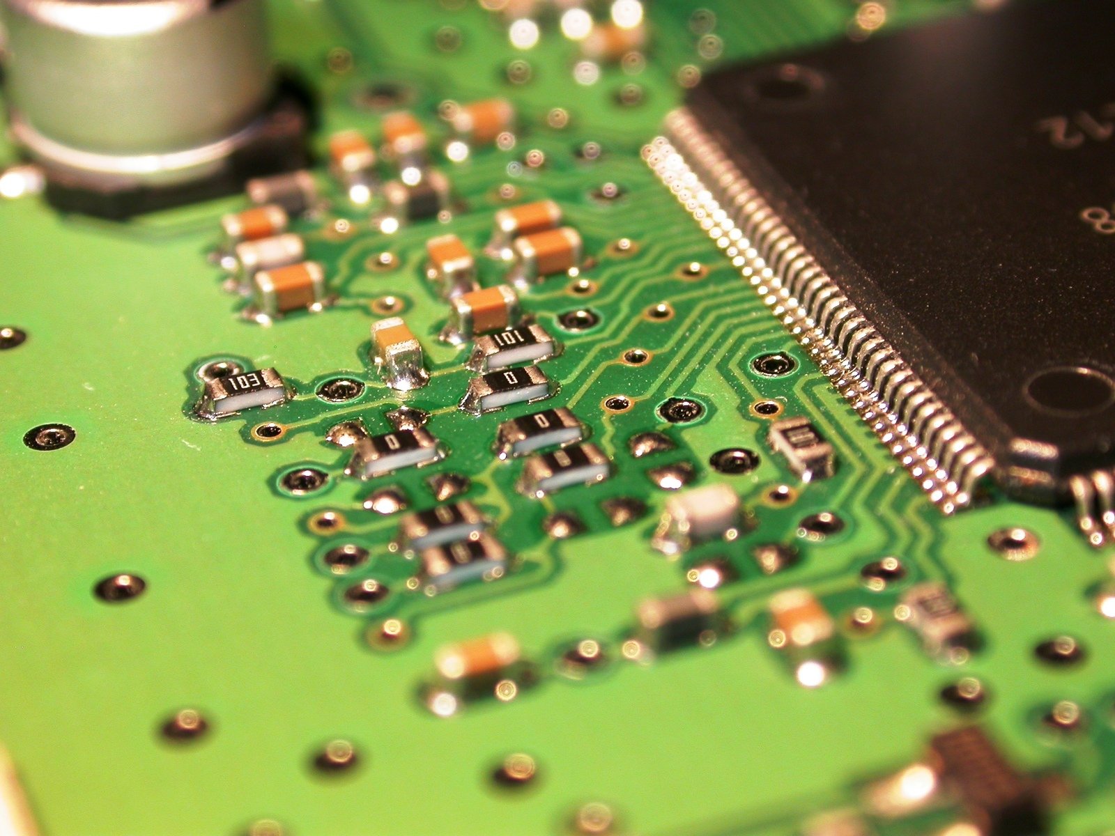 closeup view of electronic parts on a computer board