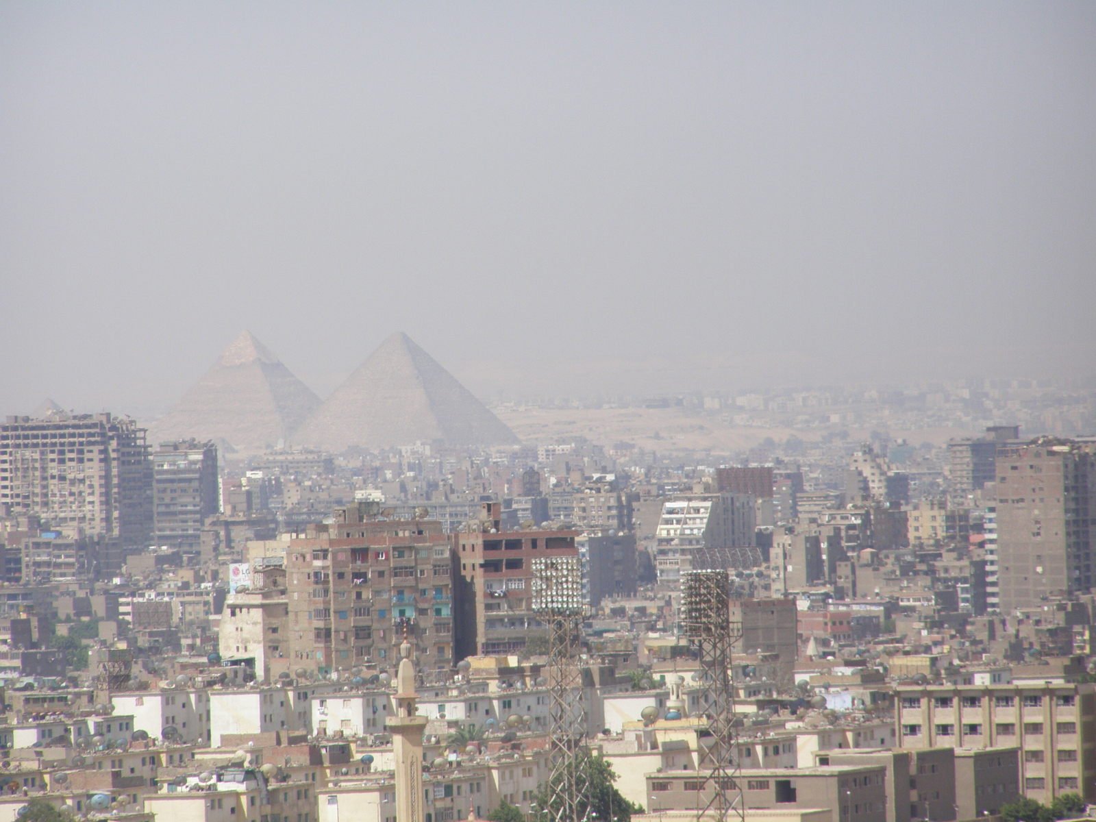 view of two pyramids in the distance from a skyline