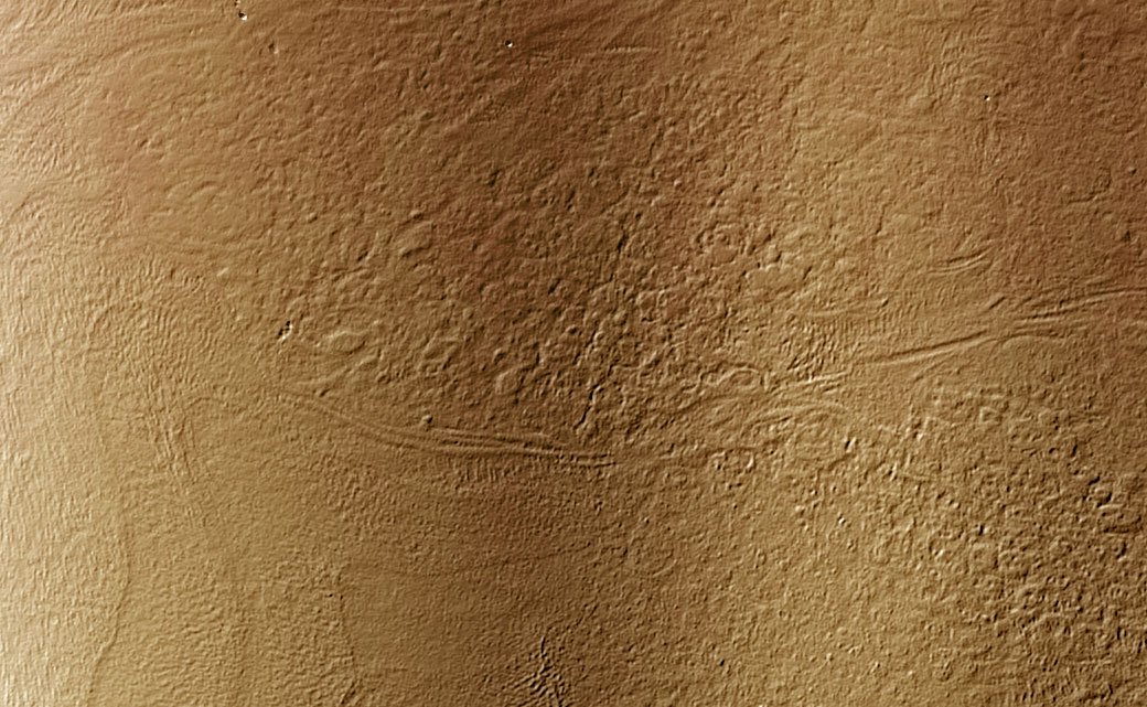 a close up of the brown texture on an exterior stucco