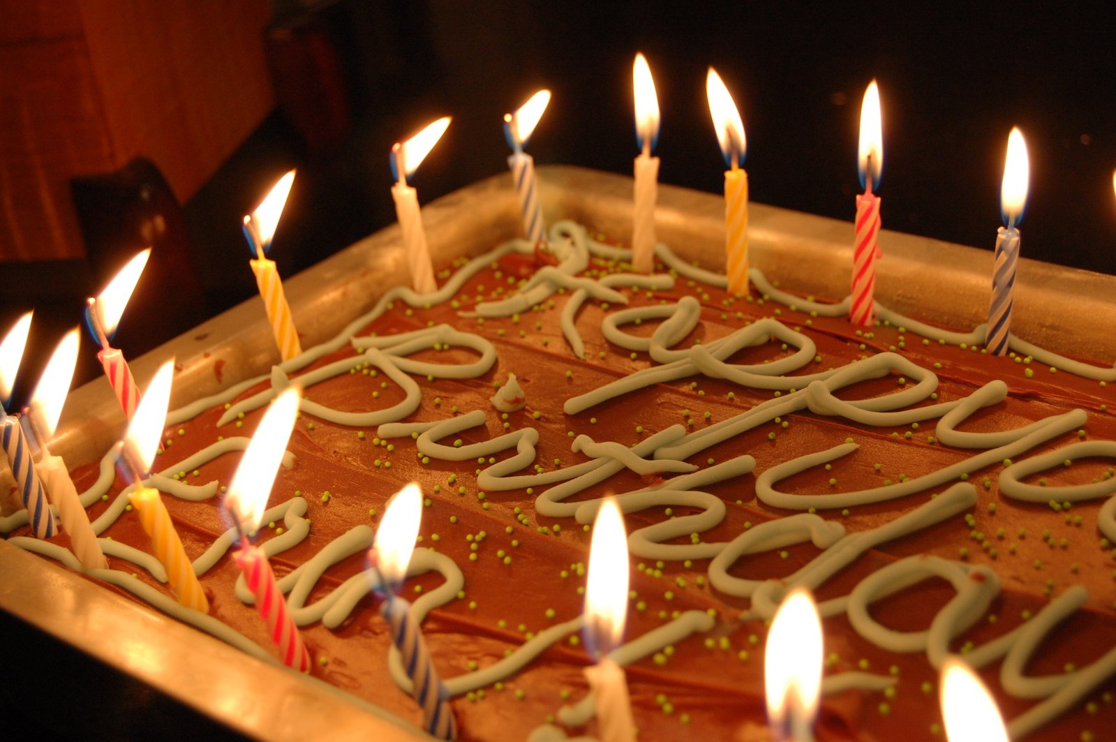 a birthday cake with candles on top of it