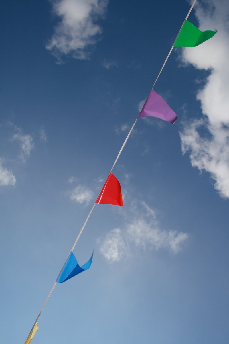 a kite that is flying high in the air