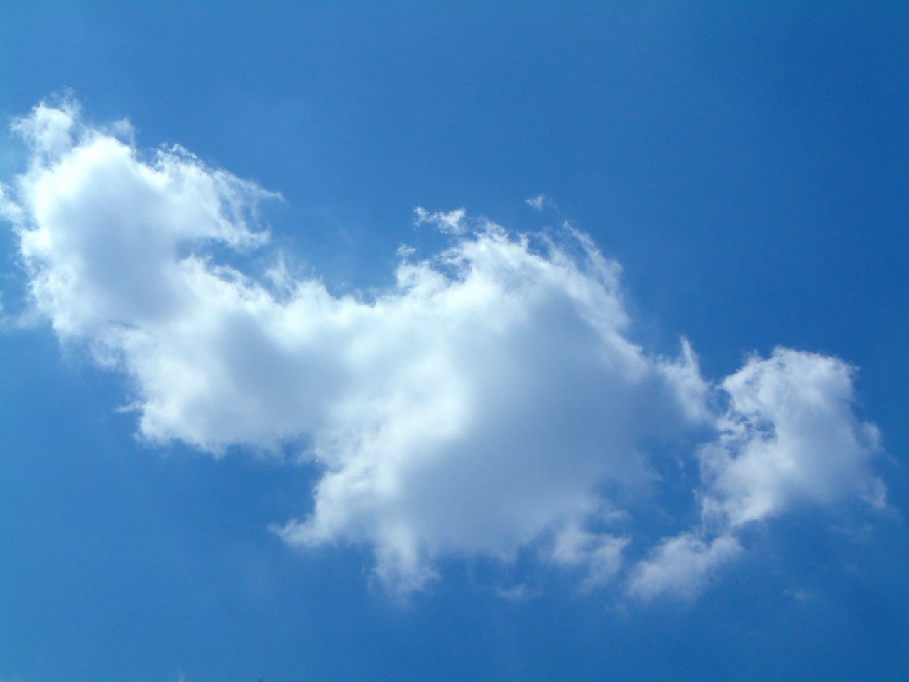 a view of a sky filled with clouds