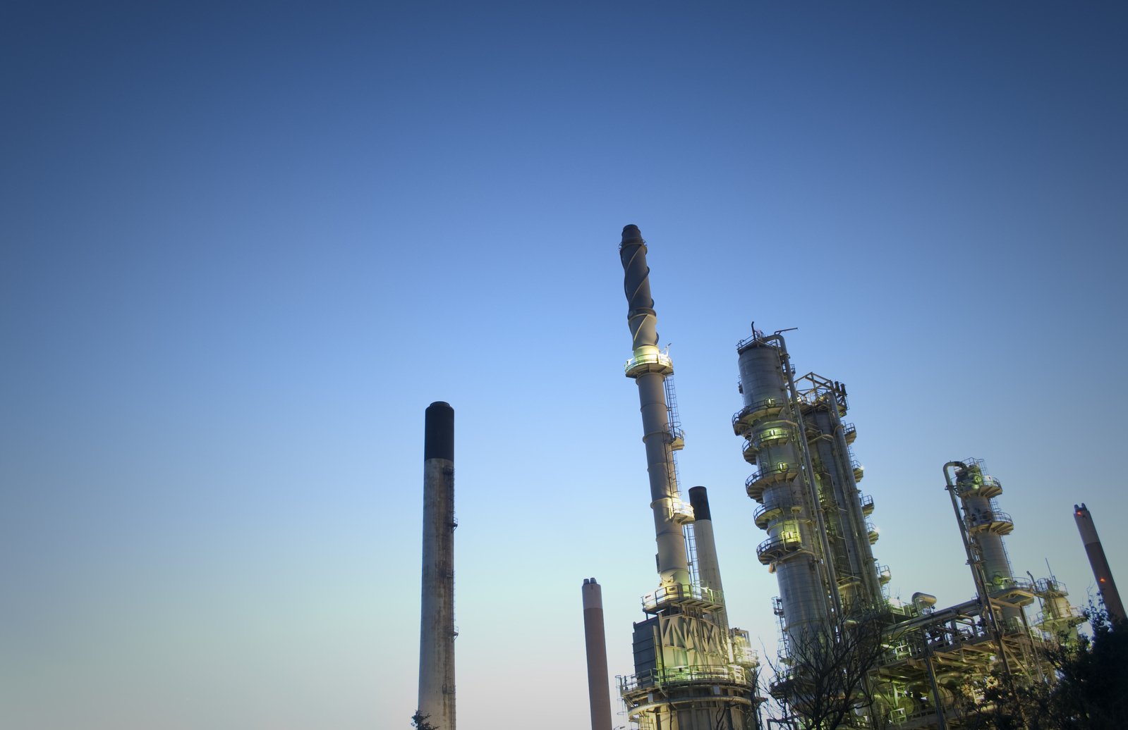 a view of an industrial factory against the sky