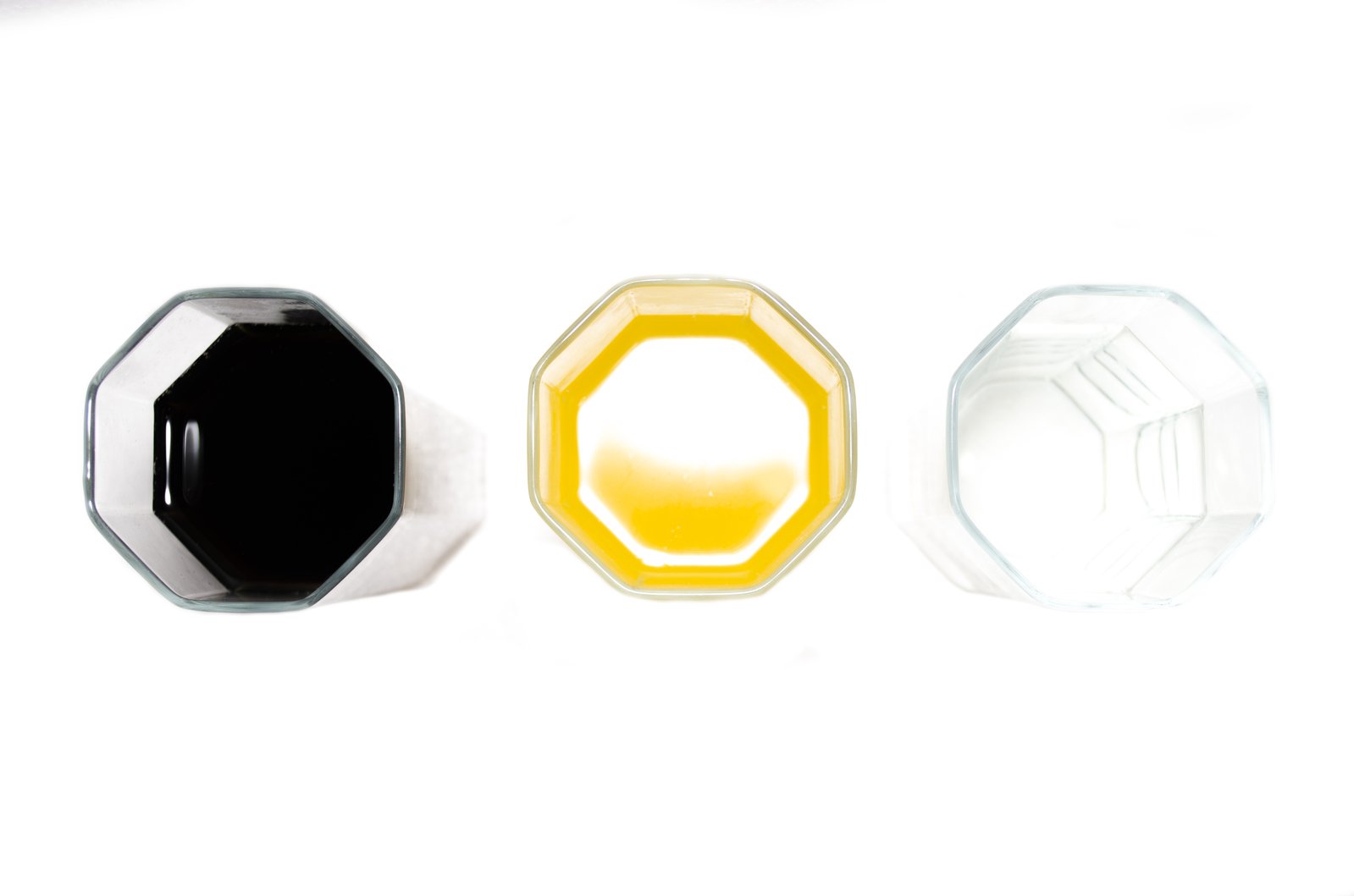 three plastic hexagonals of different shapes and sizes