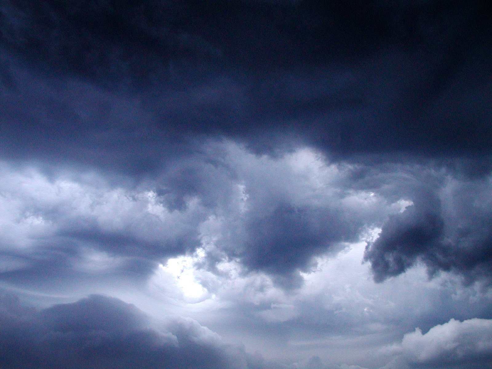 a group of clouds are in the sky