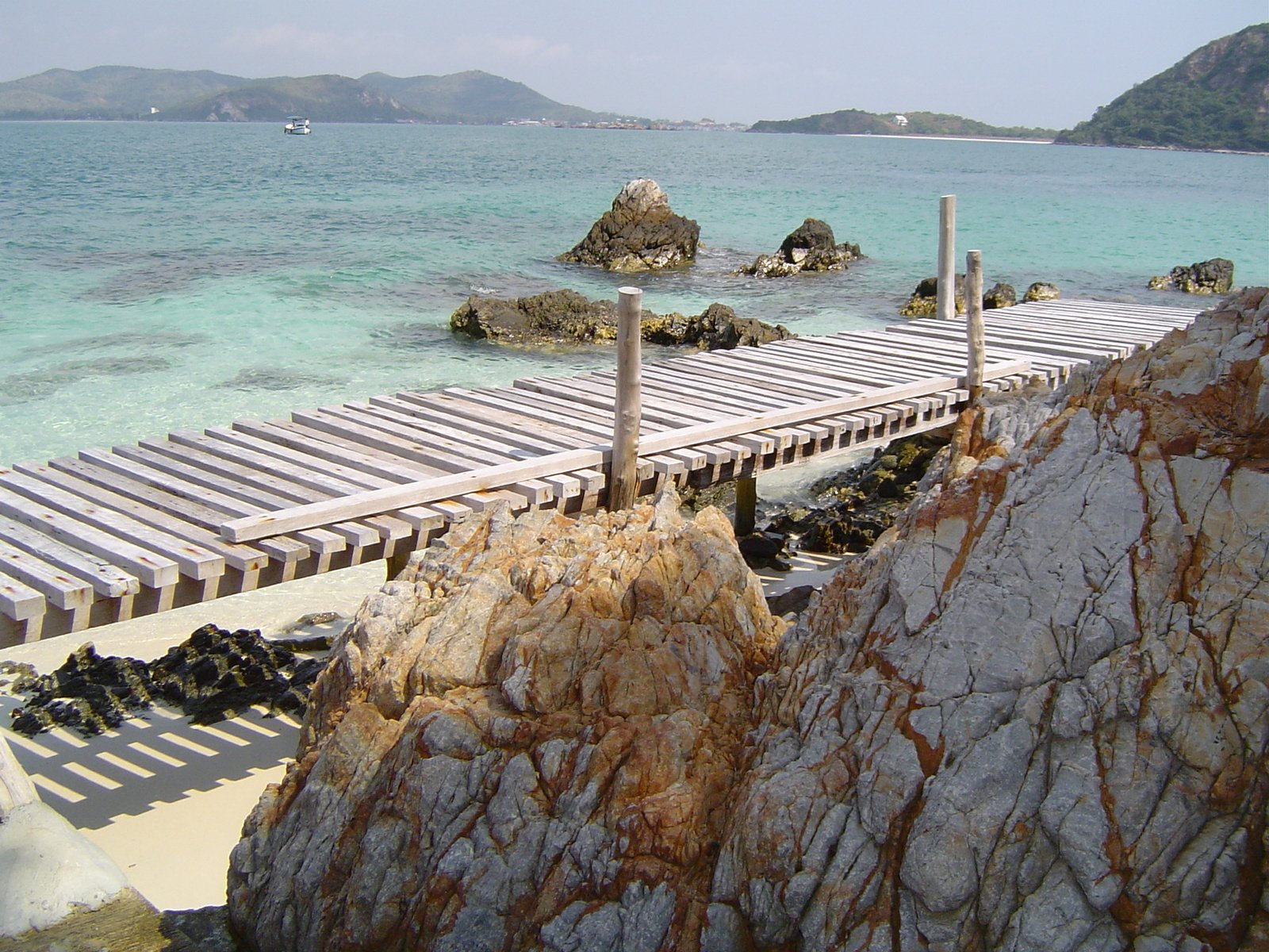 this is a po of a pier at the edge of the water