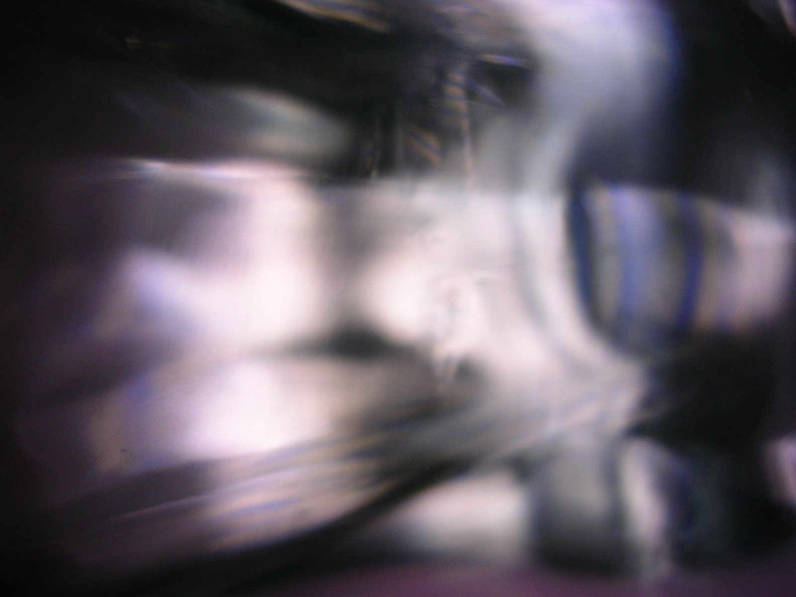 blurry image of abstract images showing an airplane's interior