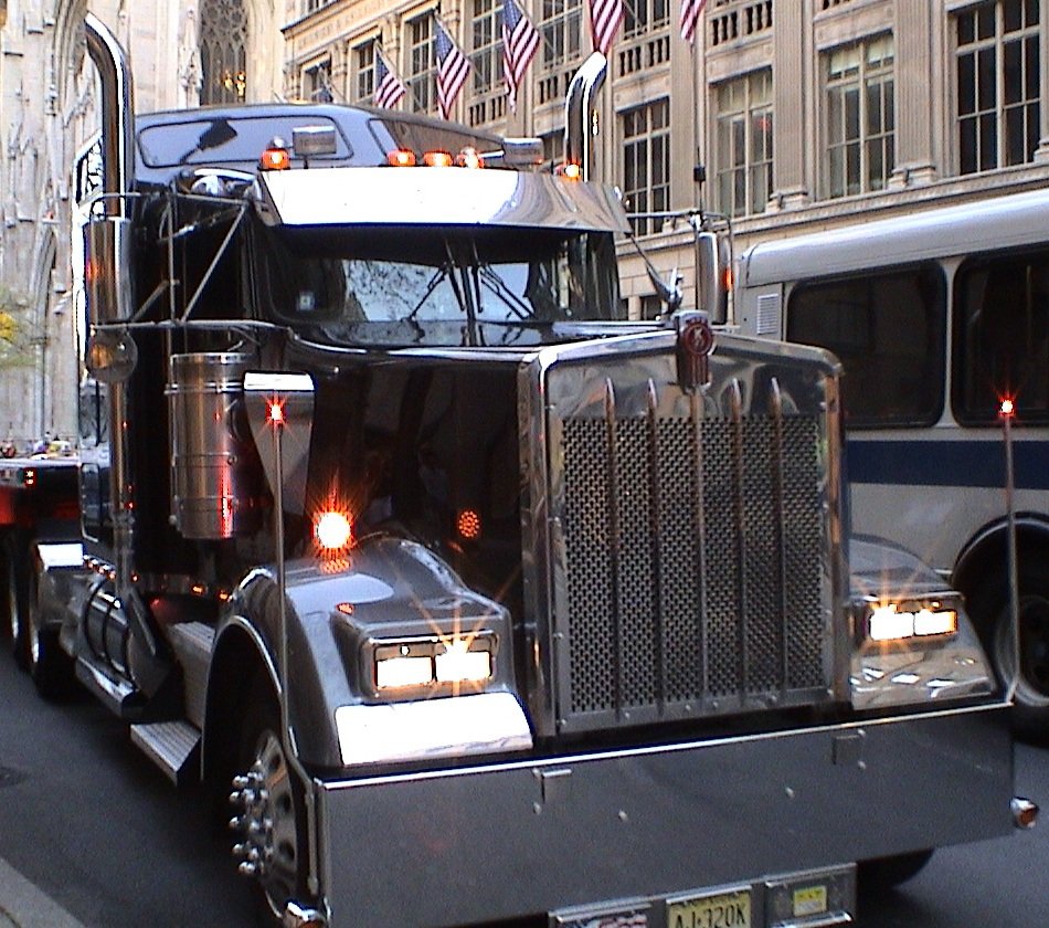 a big truck is parked along the street