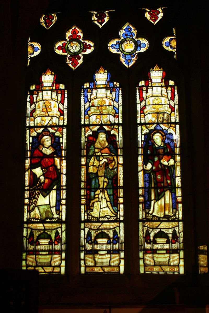 this is a stain glass window with a couple of figures