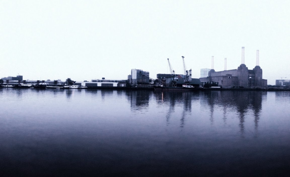 a large body of water surrounded by tall buildings