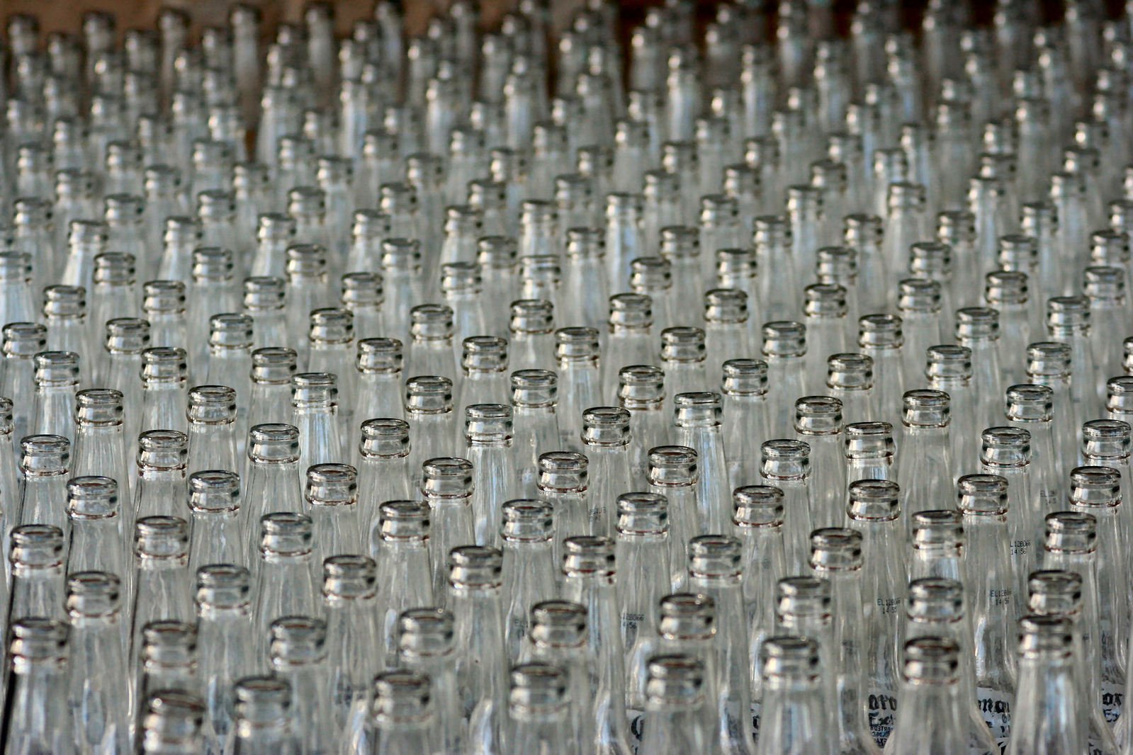 lots of empty water bottles sitting on the floor