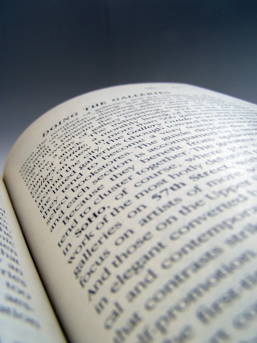 a close up of a book with words written on it