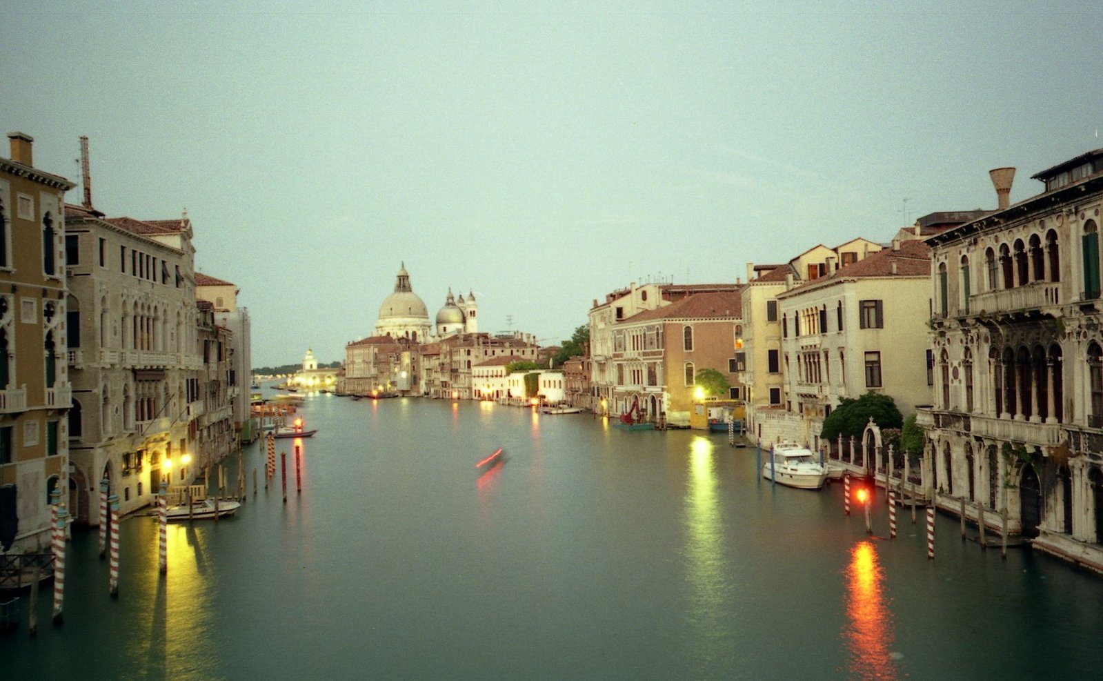 a canal running alongside old buildings in venice