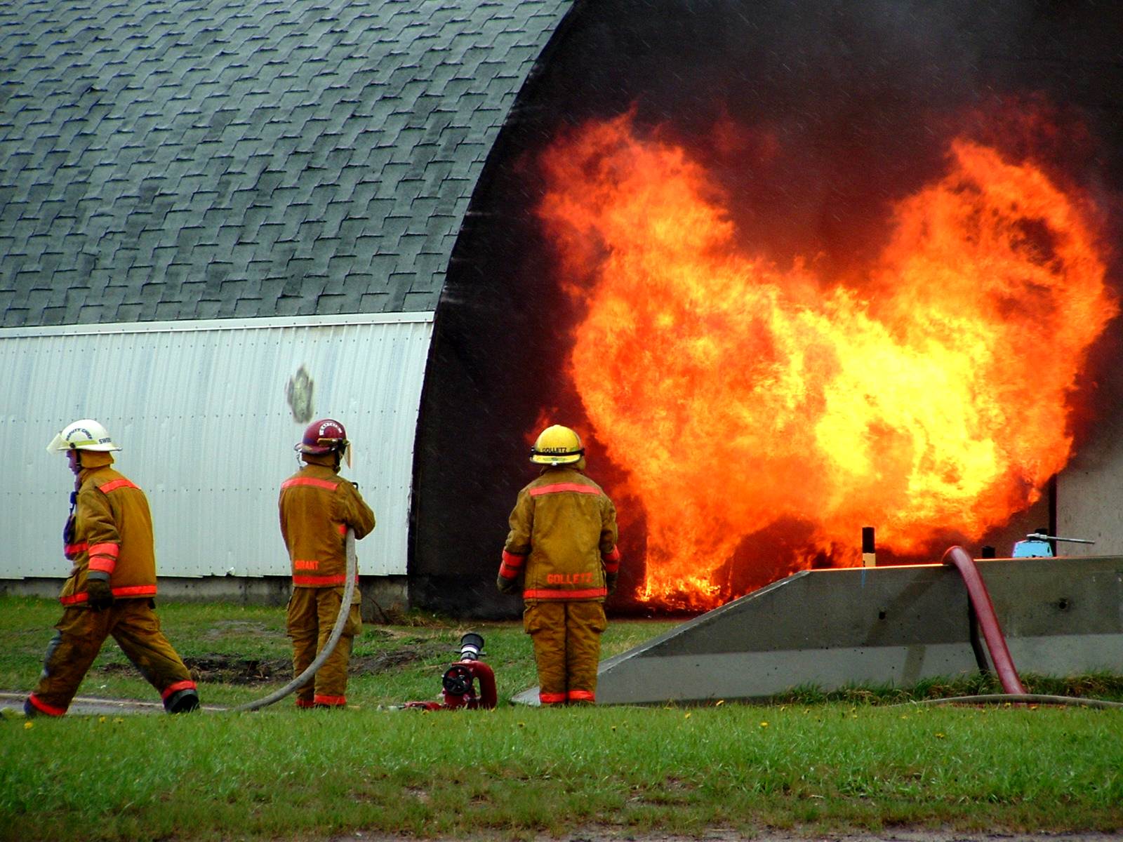 firemen are putting out a huge amount of fire