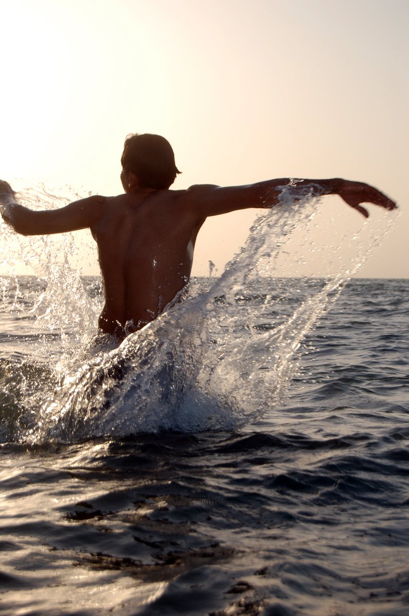 a man riding the waves in the ocean