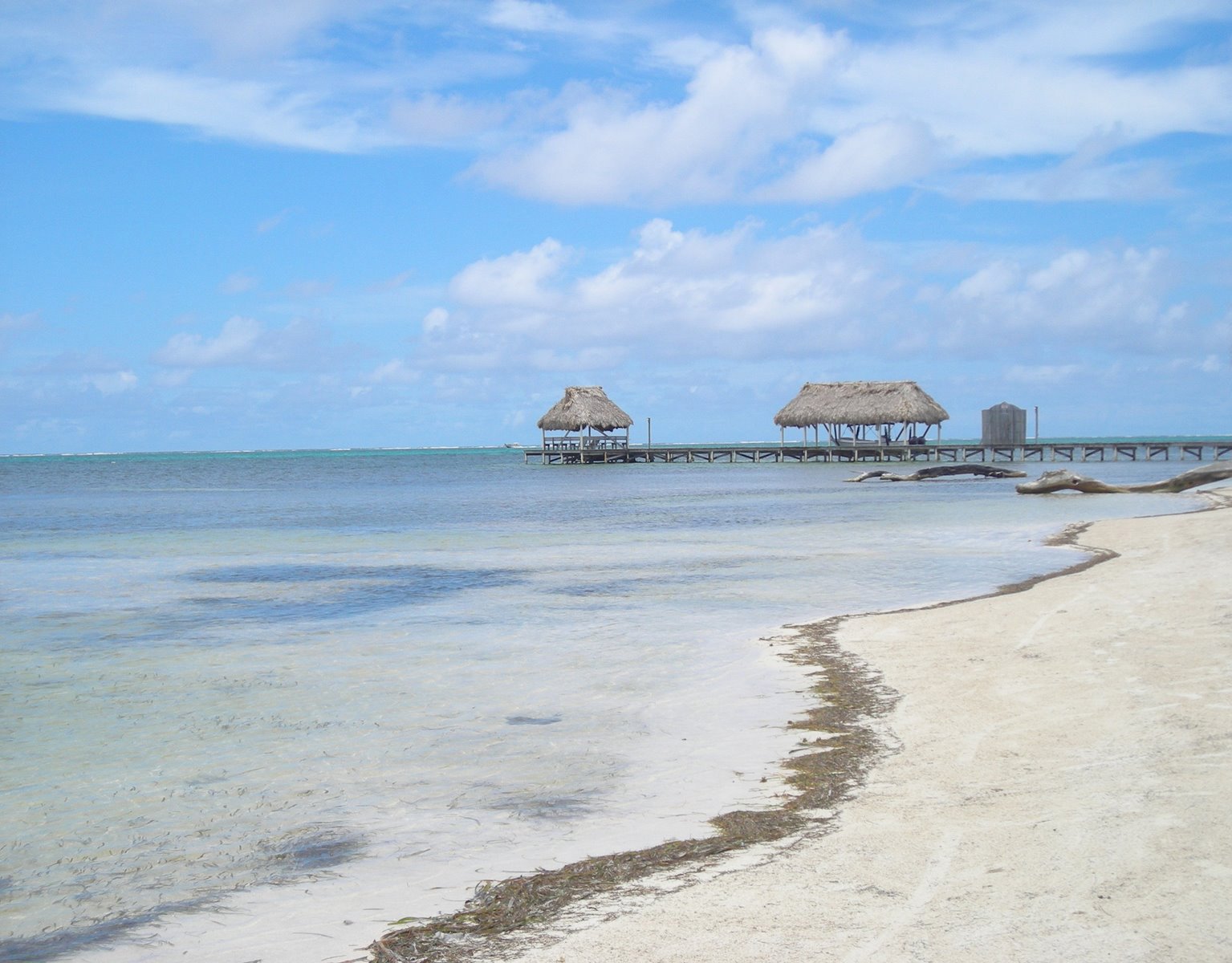 there are some huts that are by the water