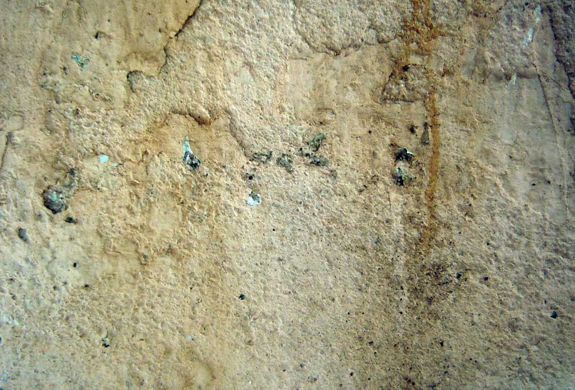 there are numerous holes and scratches on the cement