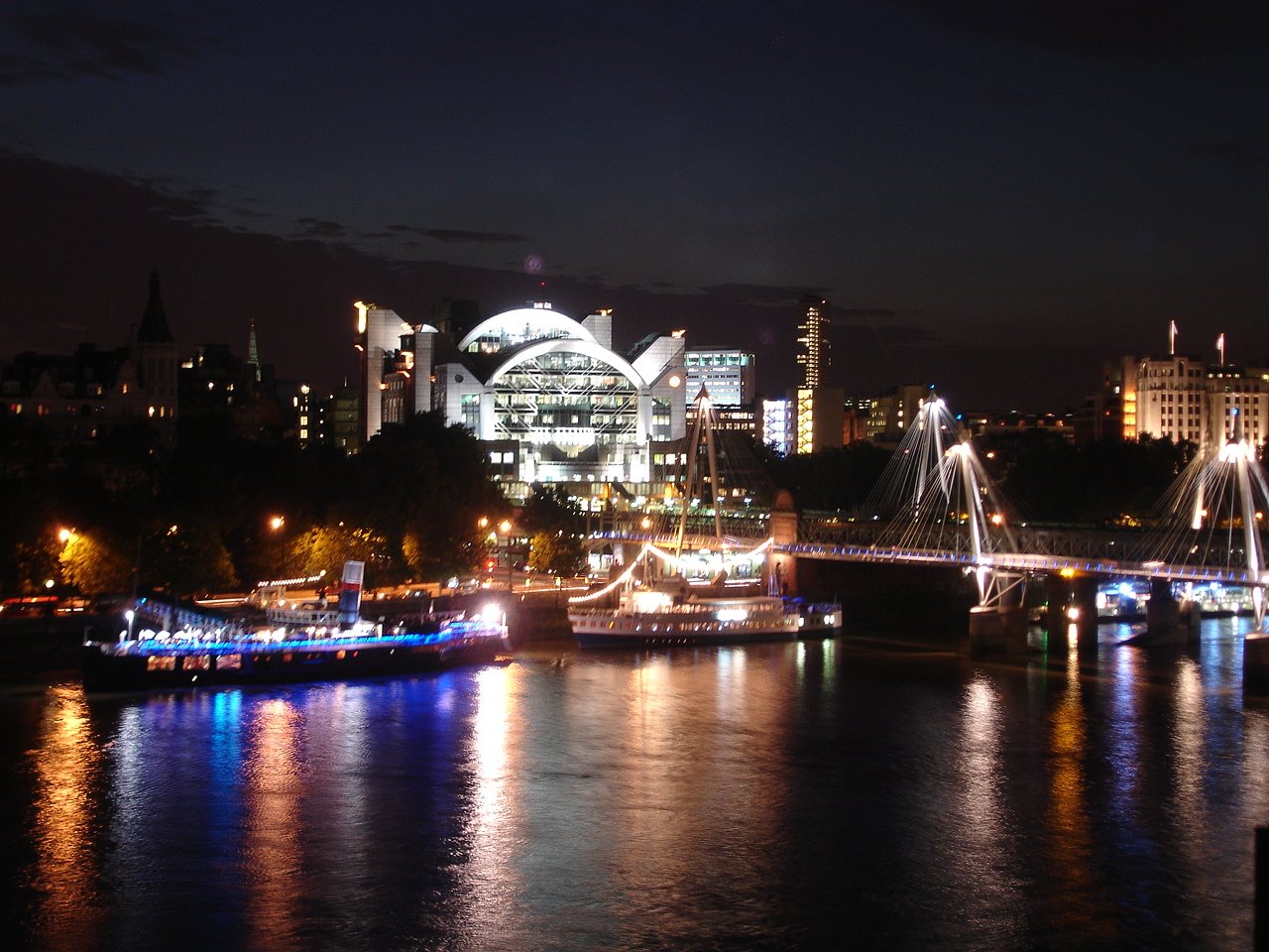 nighttime cityscape of the london bridge and city skyline