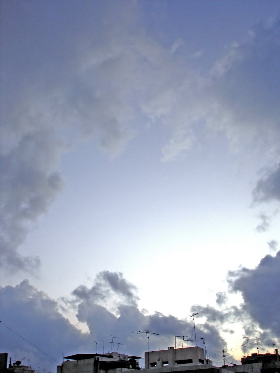 some clouds are shown in the sky and they look blue