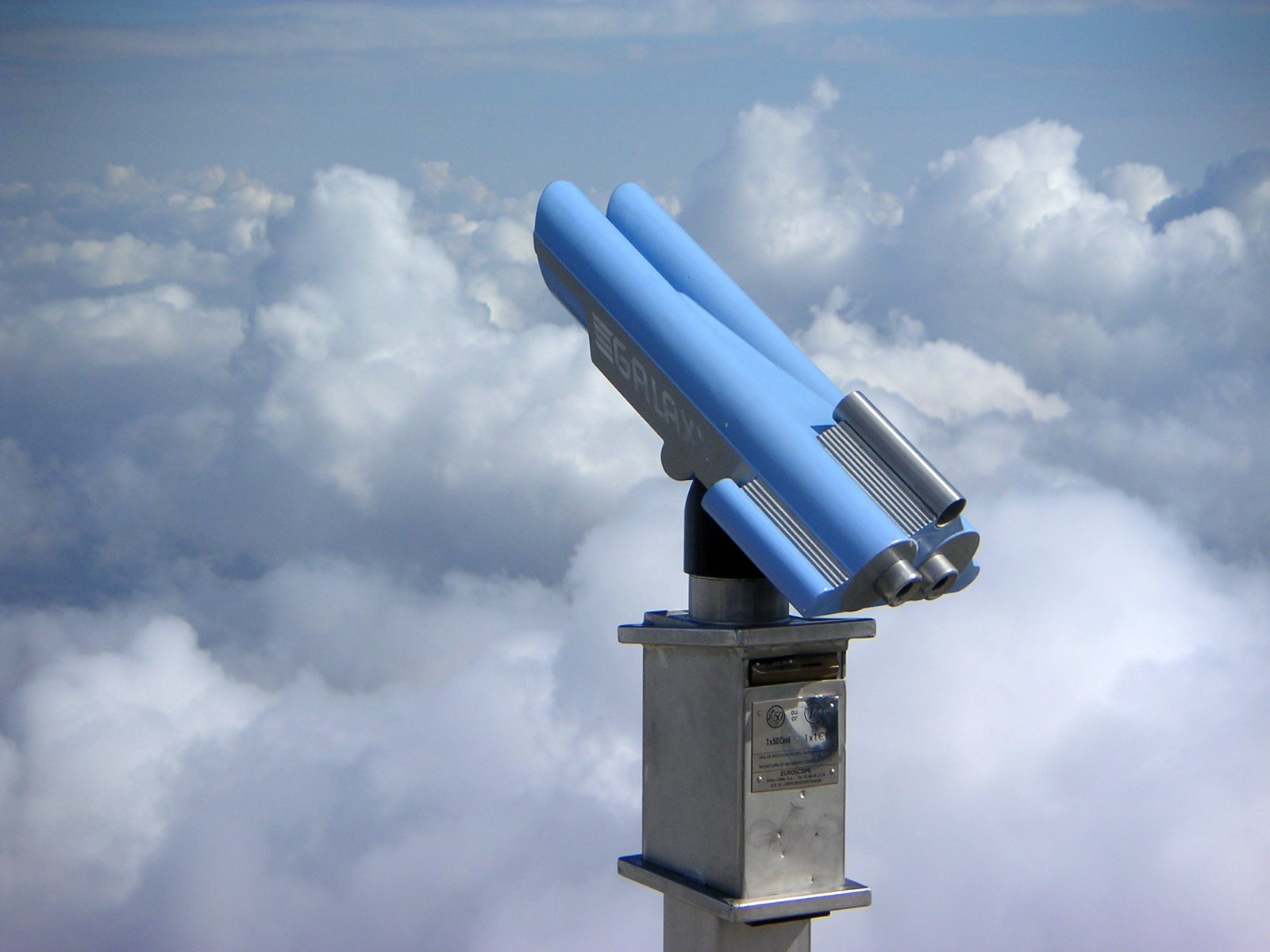 an image of a telescope that is on the side of a mountain